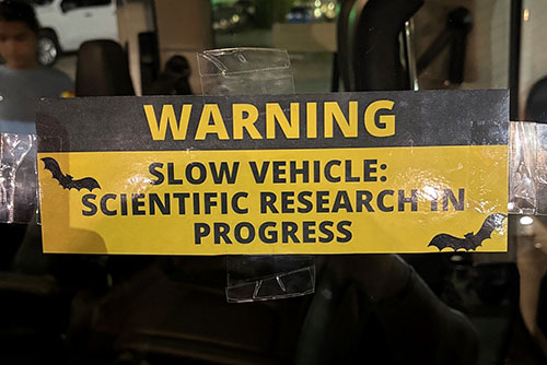 Slow-moving vehicle sign